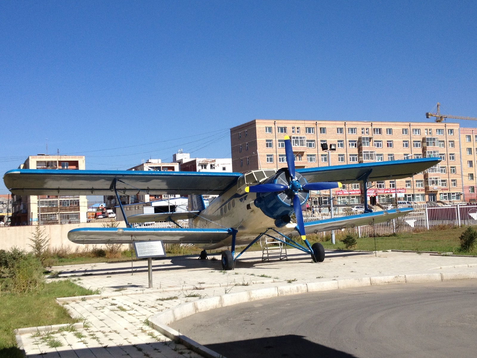 Propeller aircraft on outdoor display